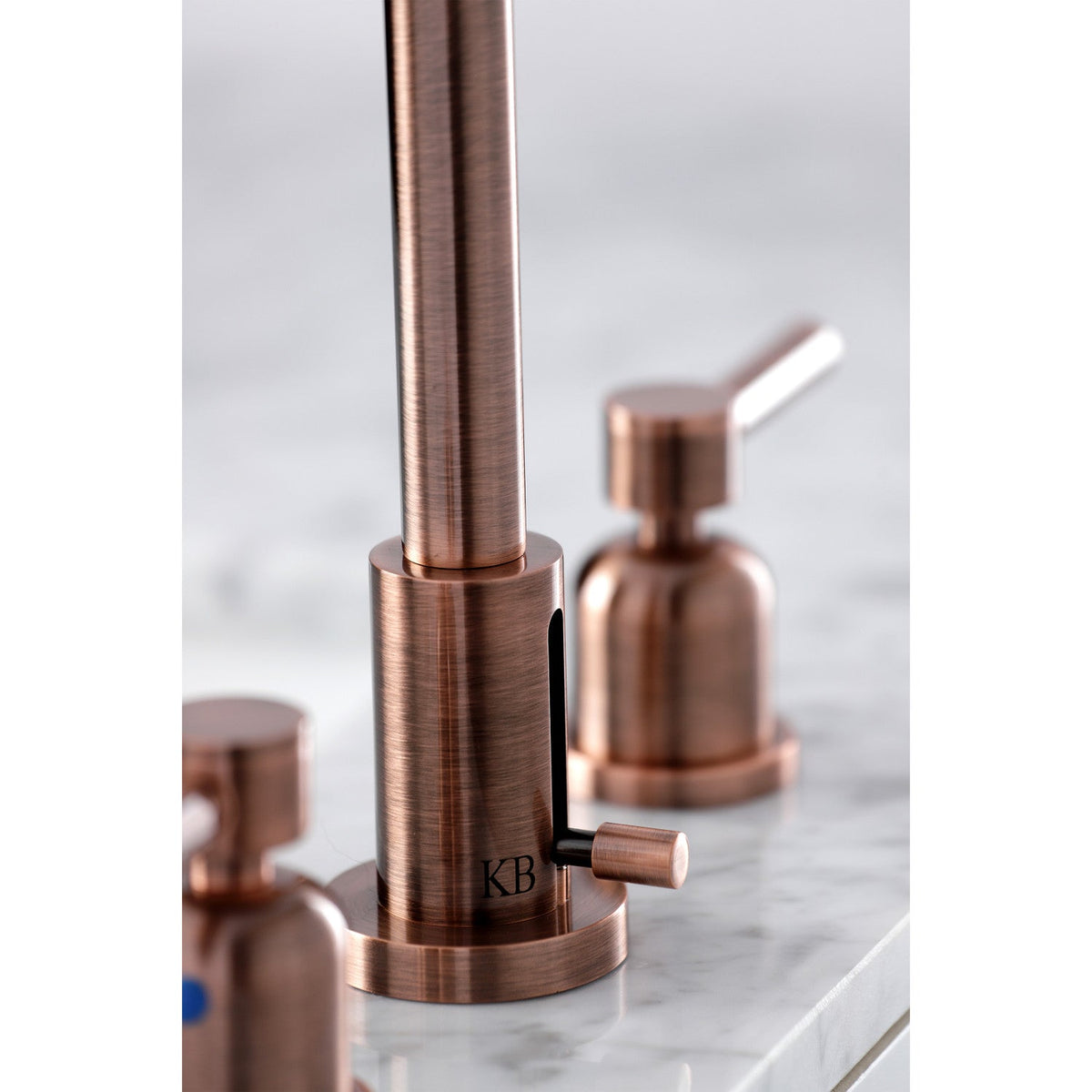 Concord Widespread Bathroom Faucet with Brass Pop-Up in Antique Copper