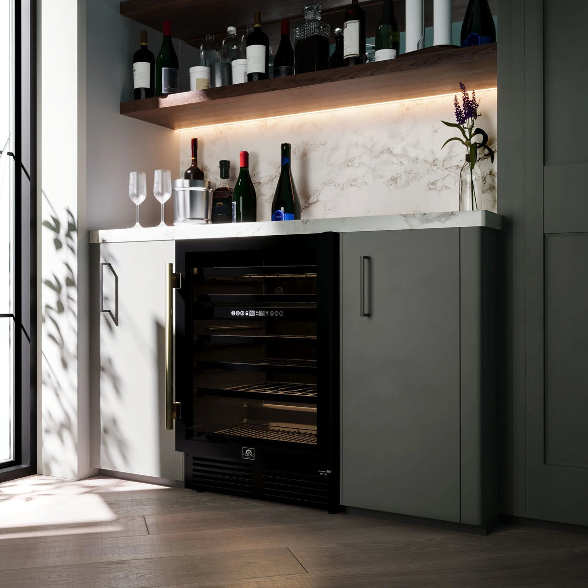 Forno Bachino 24-Inch Built-In or Freestanding Wine Cooler in Black with Antique Brass Trim, with LED Lighting, Triple Glass Door, & 51 Bottle Capacity shown in a styled kitchen