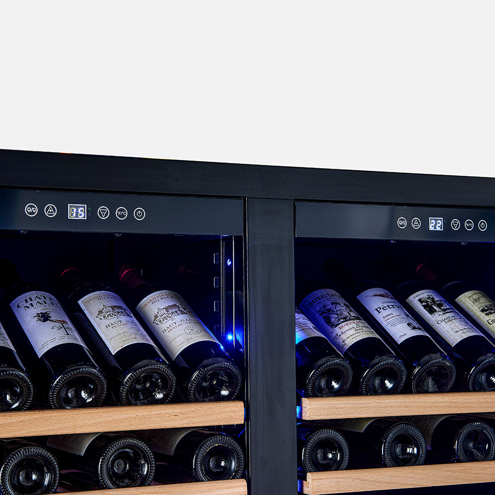 Wine cooler control panel above blue-lit shelves with bottles behind glass