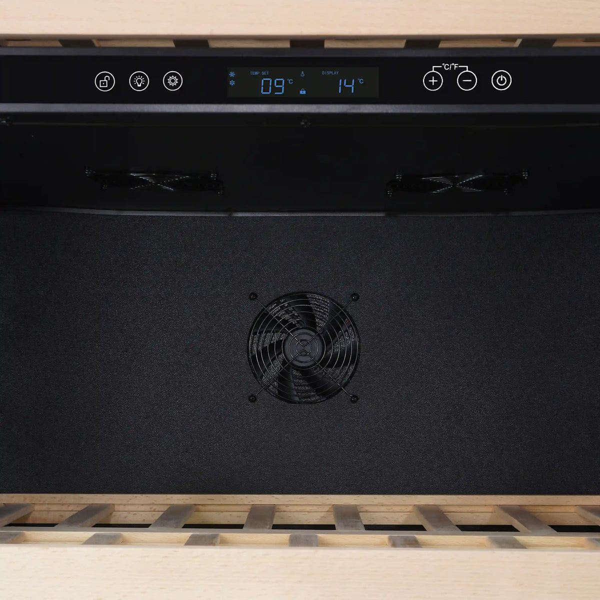 Dual-zone wine cooler bottom area with control display and cooling fan grille