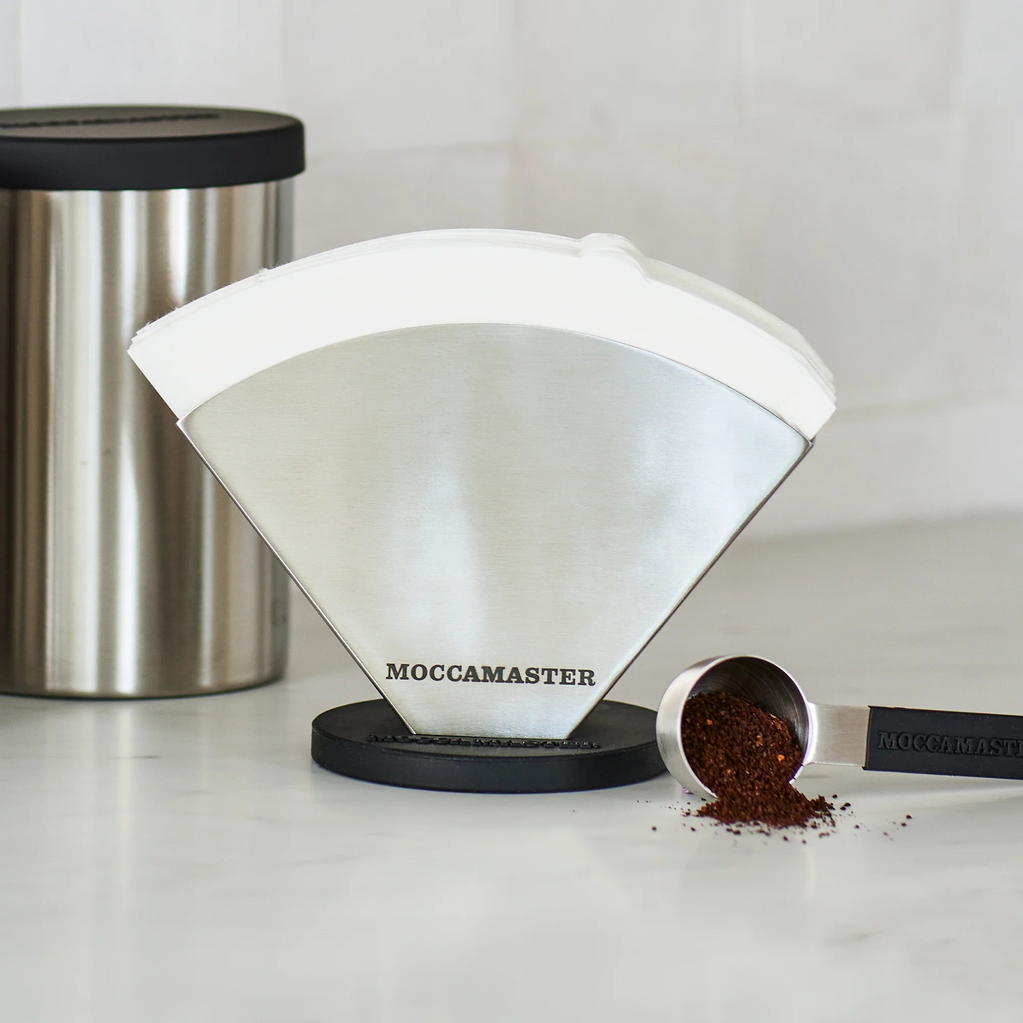 No.4 coffee filter cone on brewer stand with coffee grounds