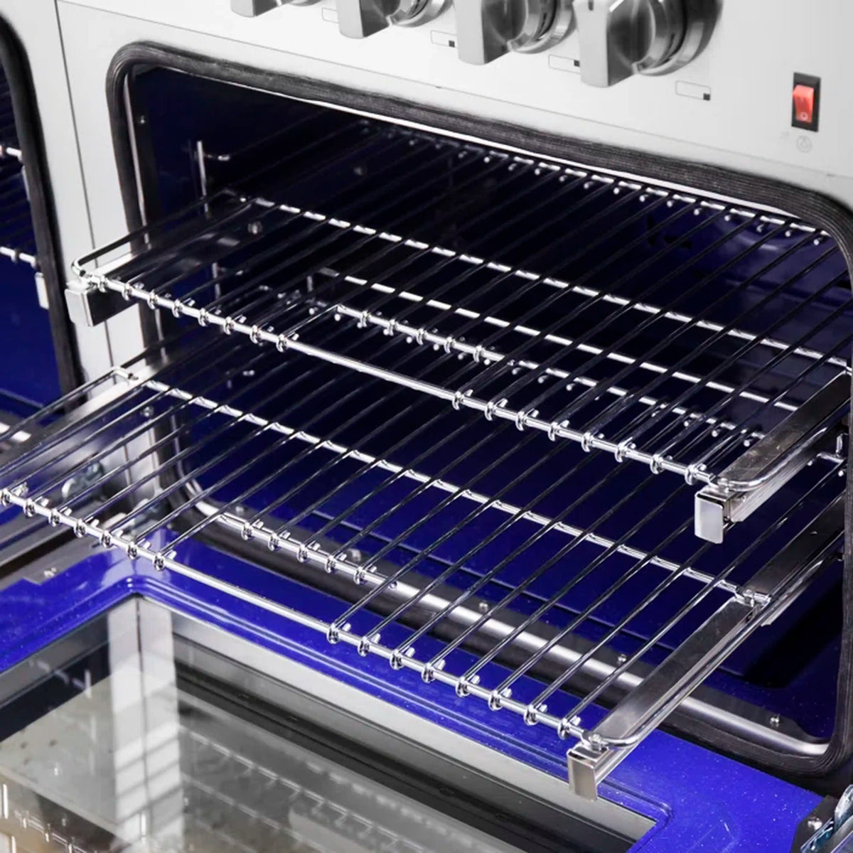 Dual fuel range oven with chrome wire rack and blue enamel interior