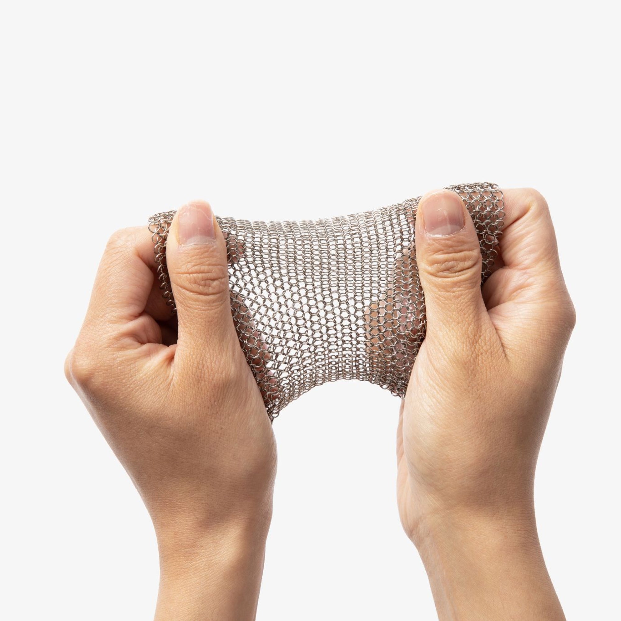 Metal scrub brush sleeve with mesh body held in hands