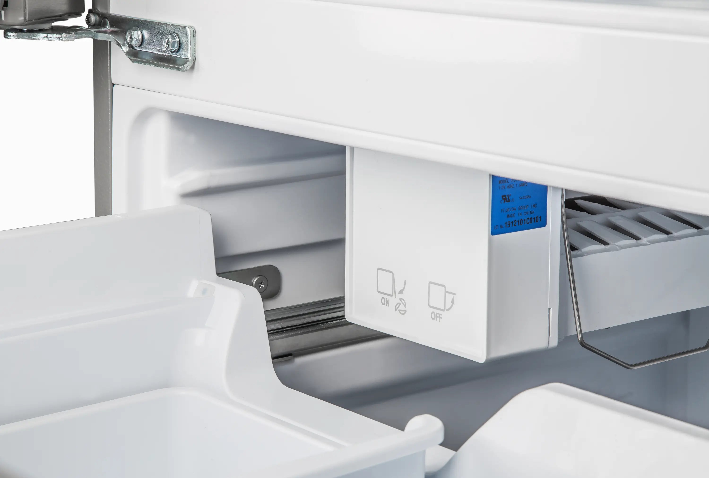 Refrigerator interior dispenser area with cover and control panel buttons