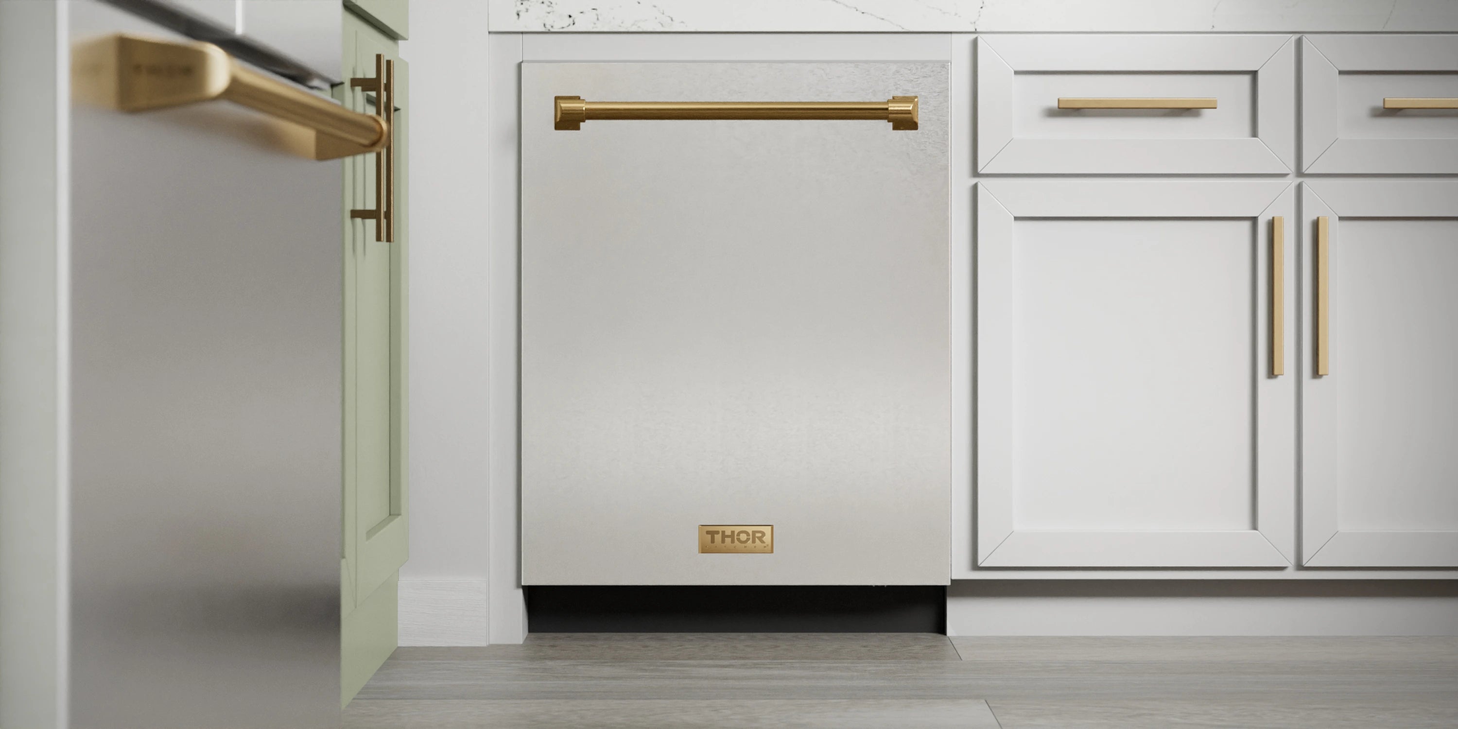 Thor 24-inch dishwasher door in stainless steel with bronze handle in white cabinetry