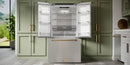 French door refrigerator with open fresh food doors and freezer drawer