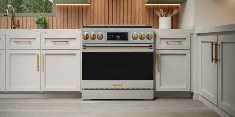 Gordon Ramsay by Thor Kitchen 3-Piece Appliance Package - 48-Inch Propane Gas Range, Double Oven, 36-Inch Refrigerator, and Dishwasher in Stainless Steel with Bronze Trim