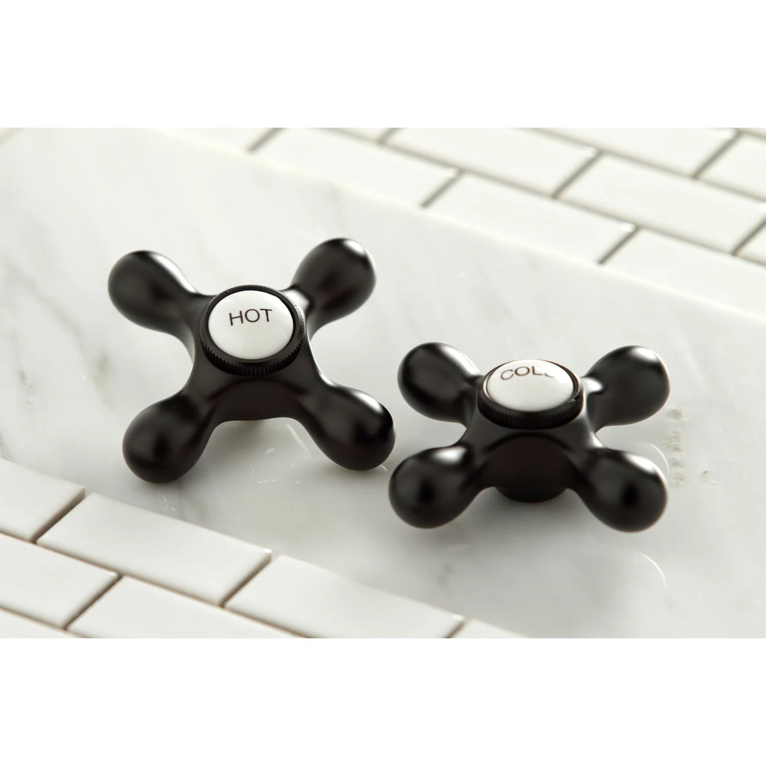 Oil-rubbed bronze hot and cold cross handles with HOT/COLD caps