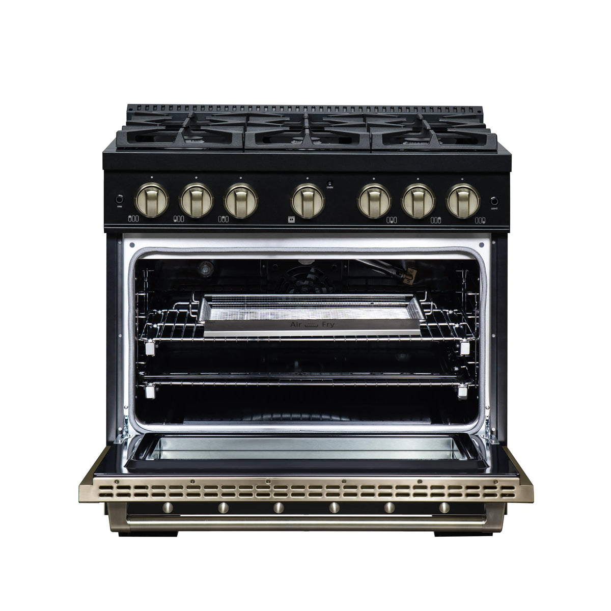 Open black gas oven with racks and broiler area; brass control knobs on front panel.