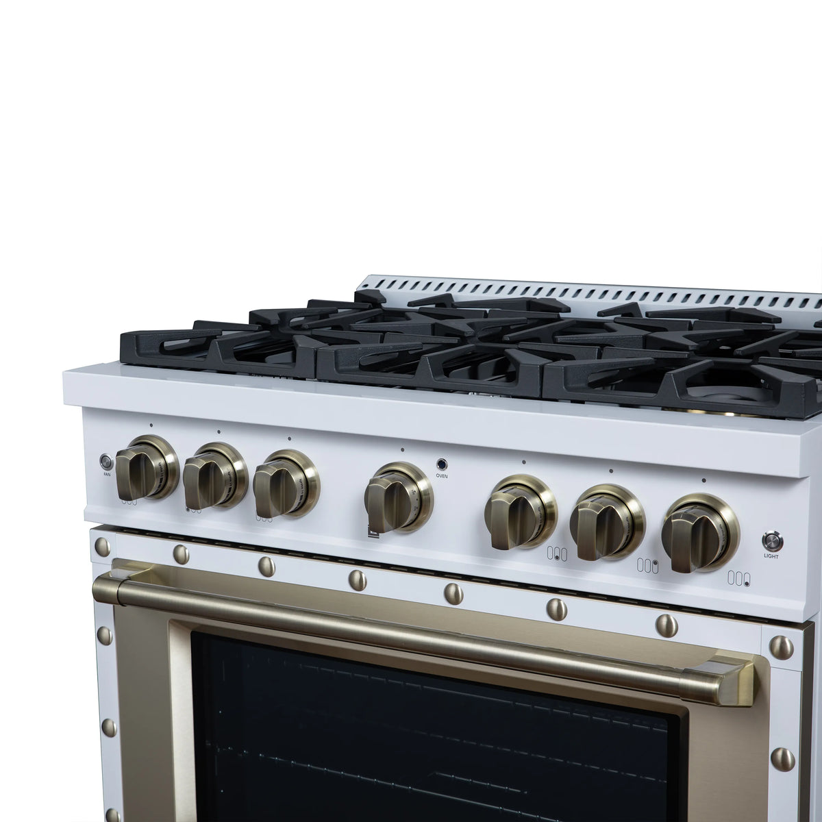 White gas range cooktop with black burner caps and brass control knobs