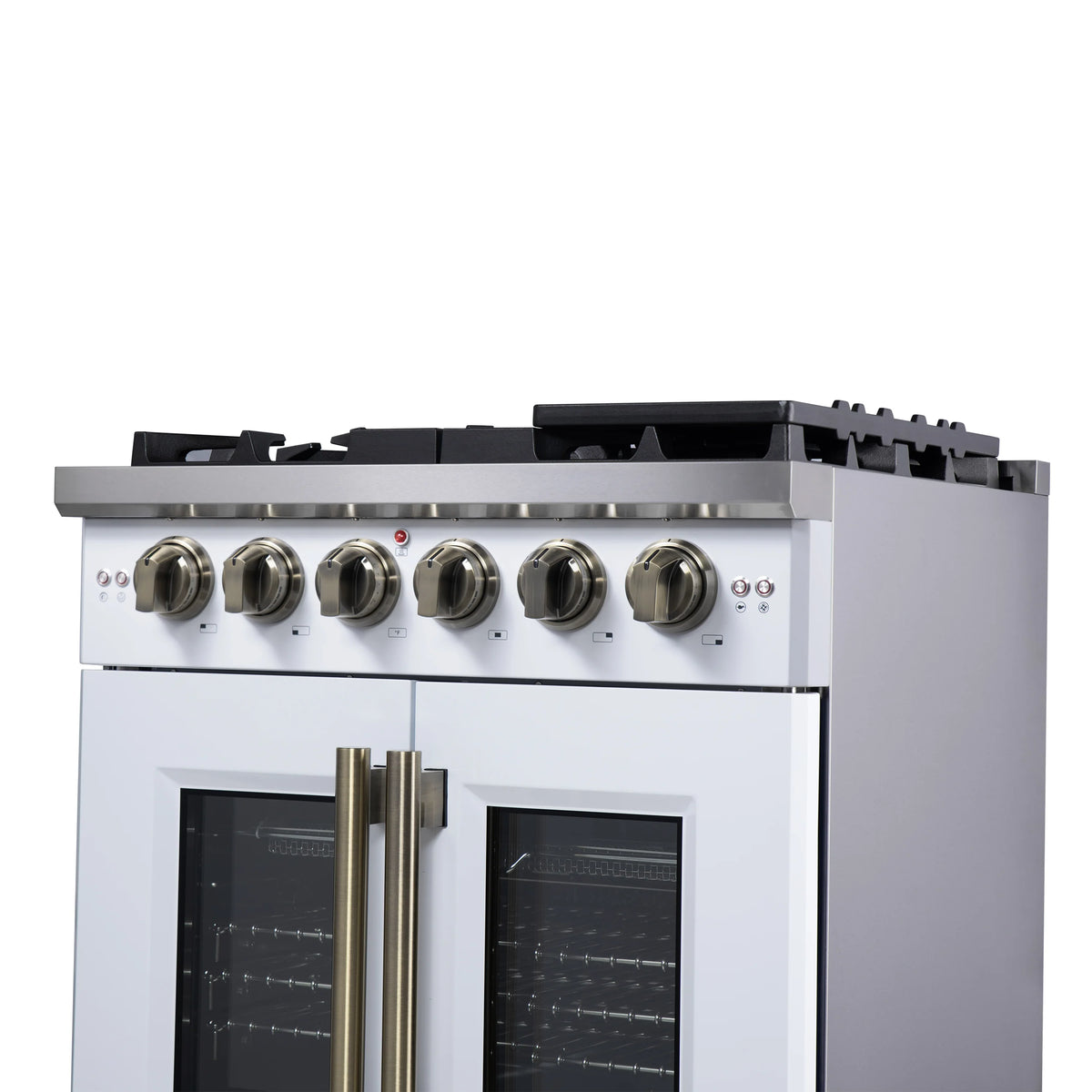 White gas range top with burner grates and brass knobs; French doors with brass handle.