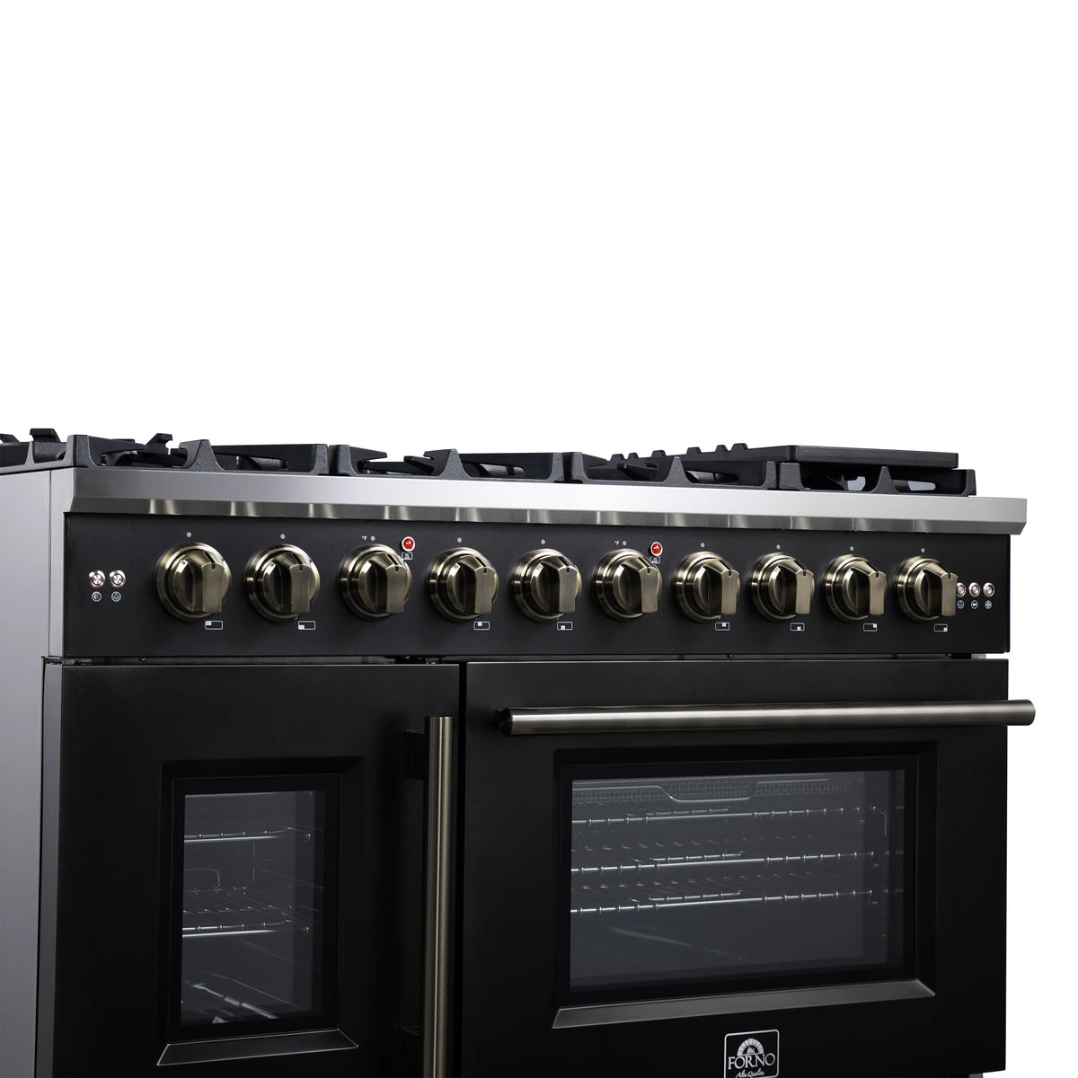 Black gas range close-up of brass knobs and glass oven doors