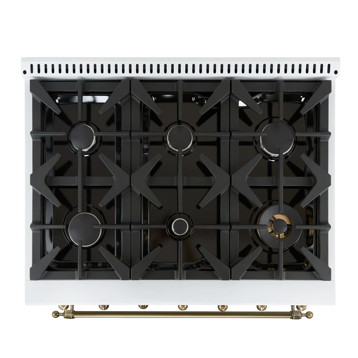 White dual fuel range cooktop with black burner grates and brass bar front rail