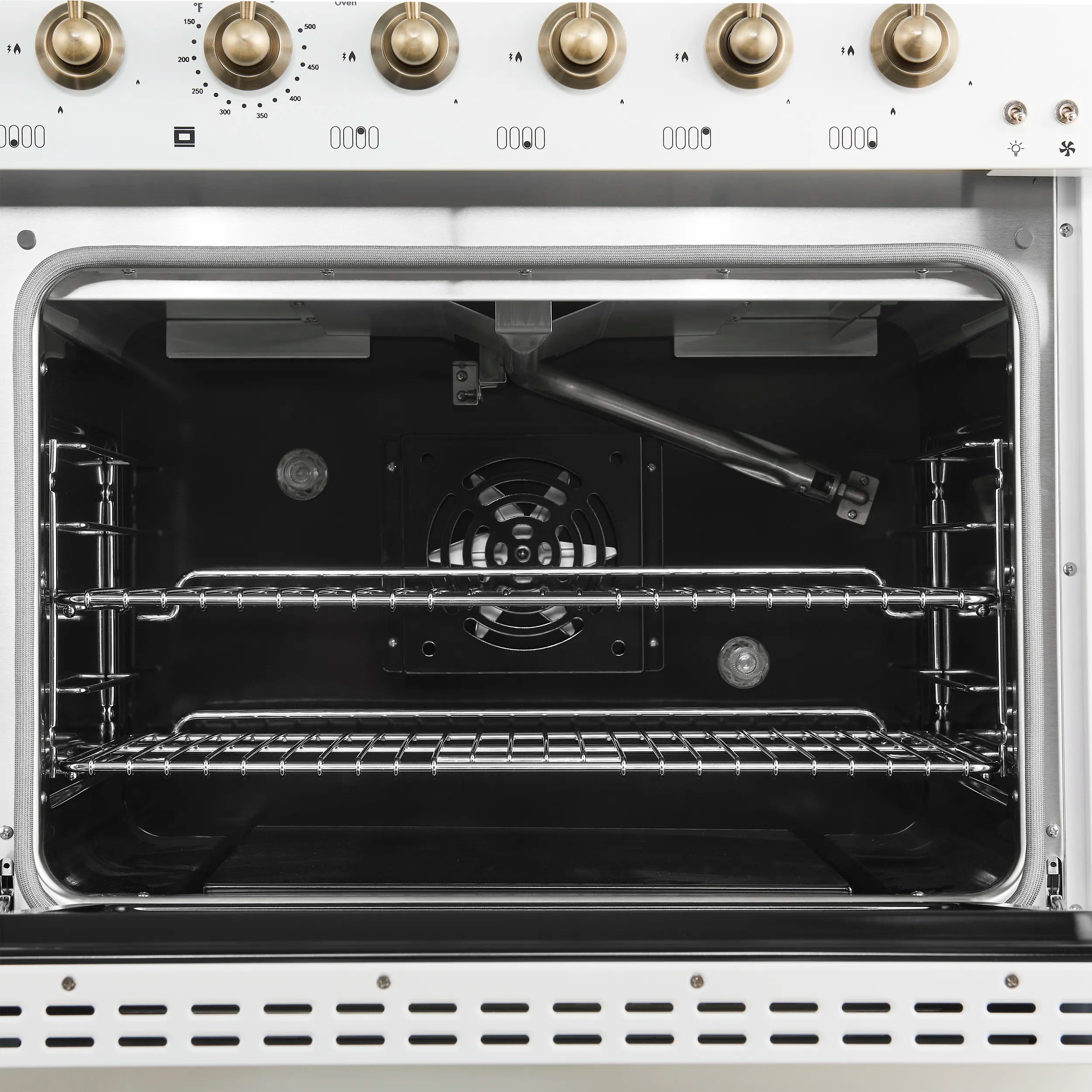 Open gas oven with back heating element and two rack levels.