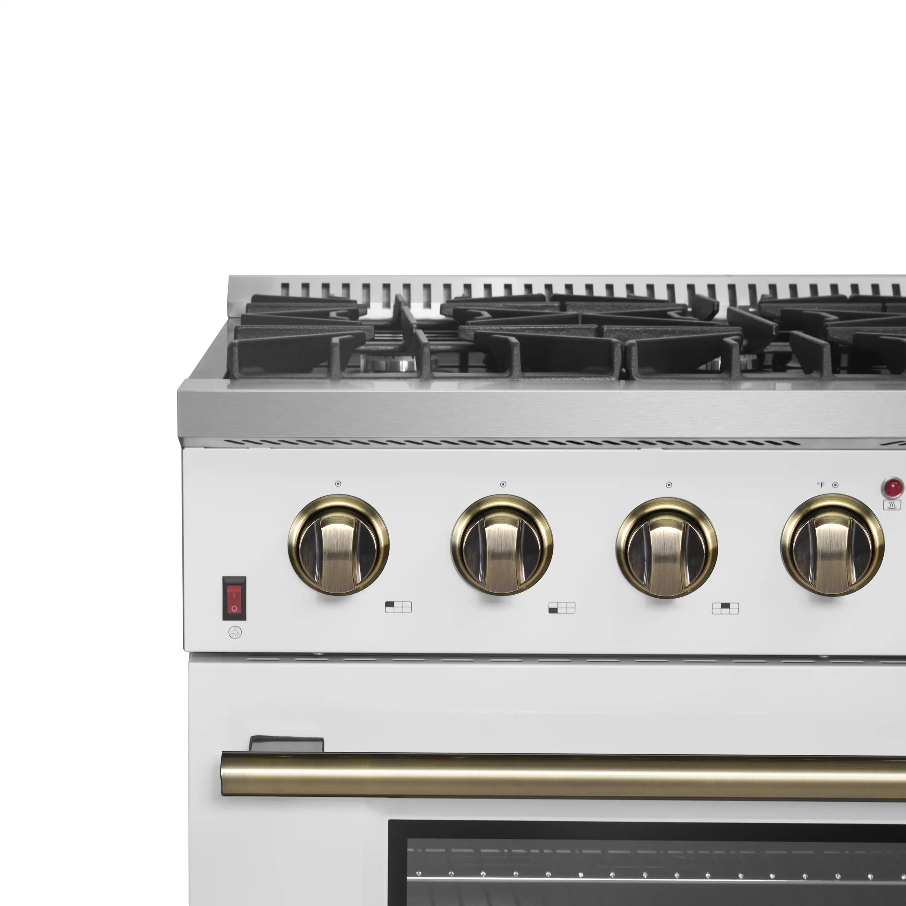 White gas range control panel with brass knobs and black burner grates