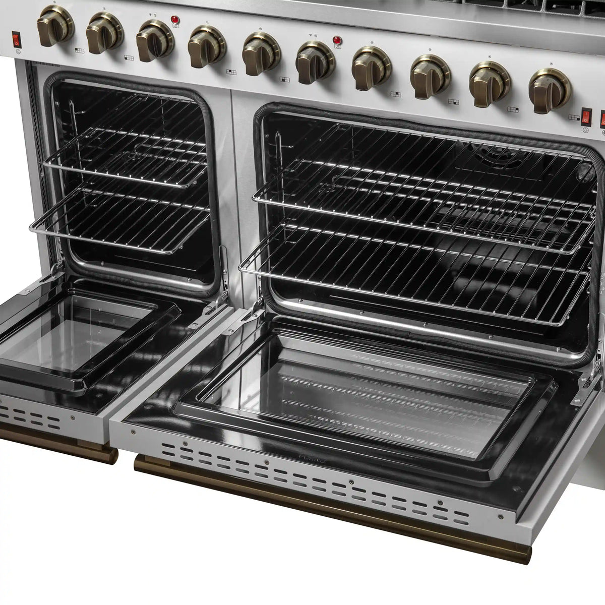White gas range with both ovens open, black racks, and brass-trim drawer bottom