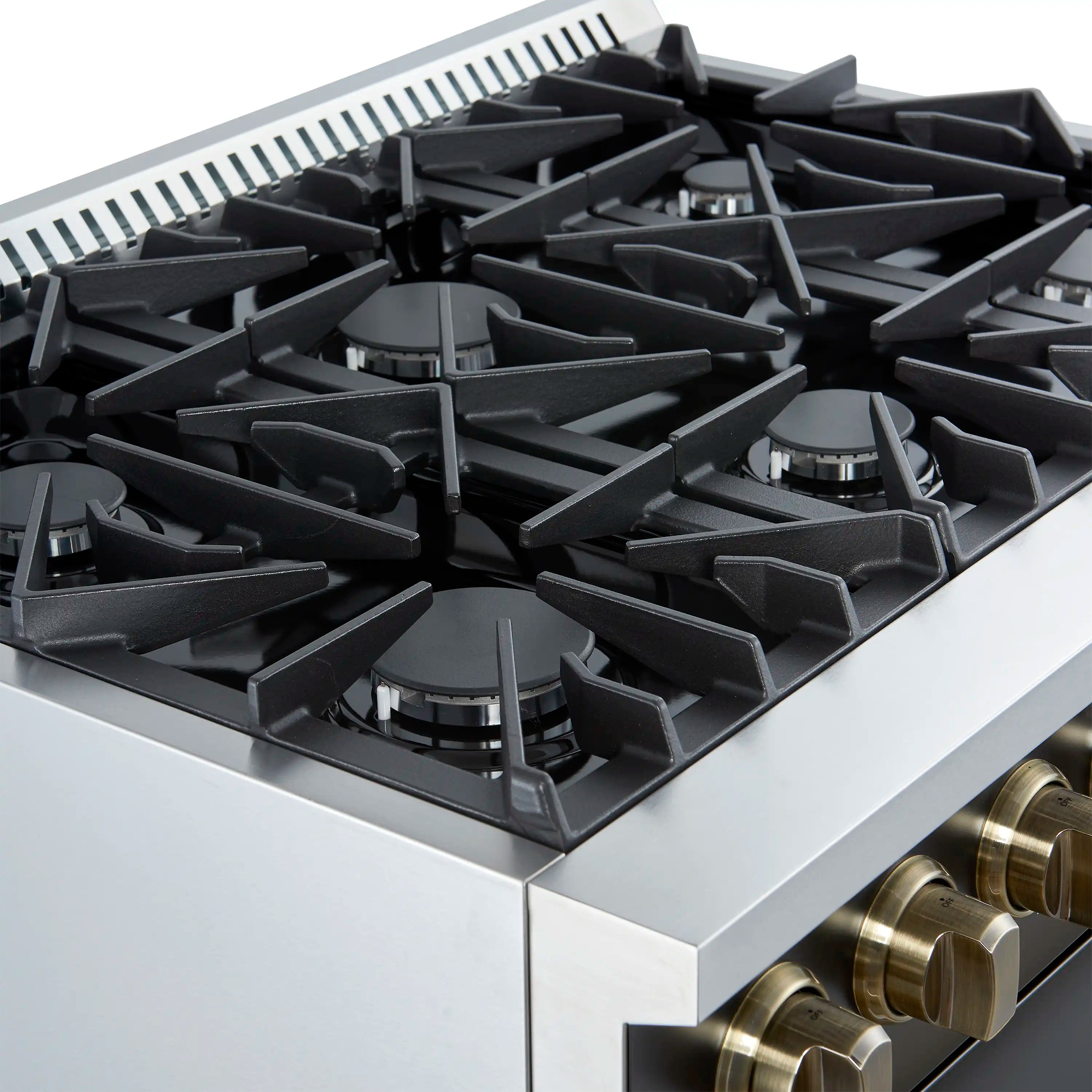 Black 6-burner cooktop grates with burner caps and brass-accented knobs