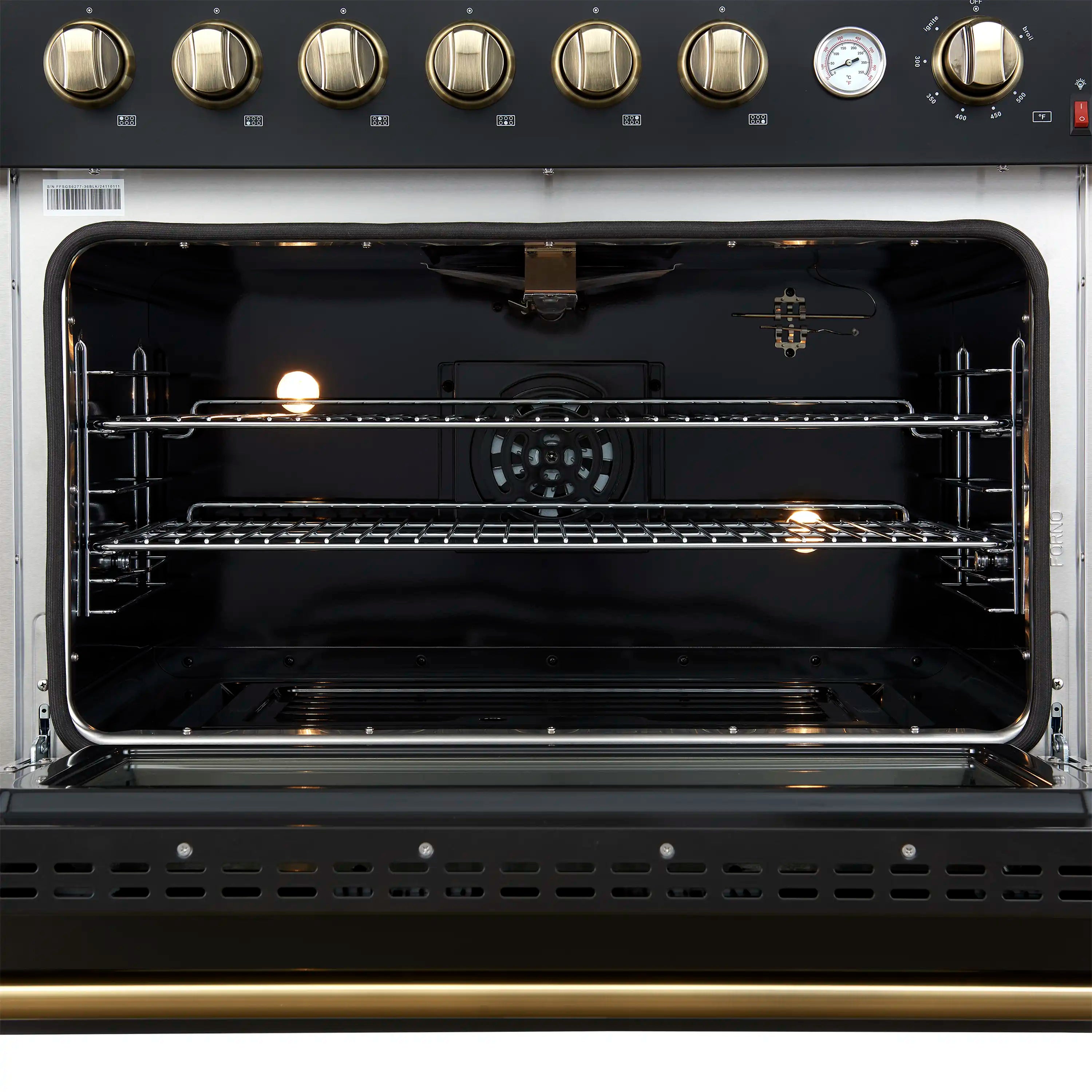 Convection oven cavity with racks, heating element area, and lit bulbs