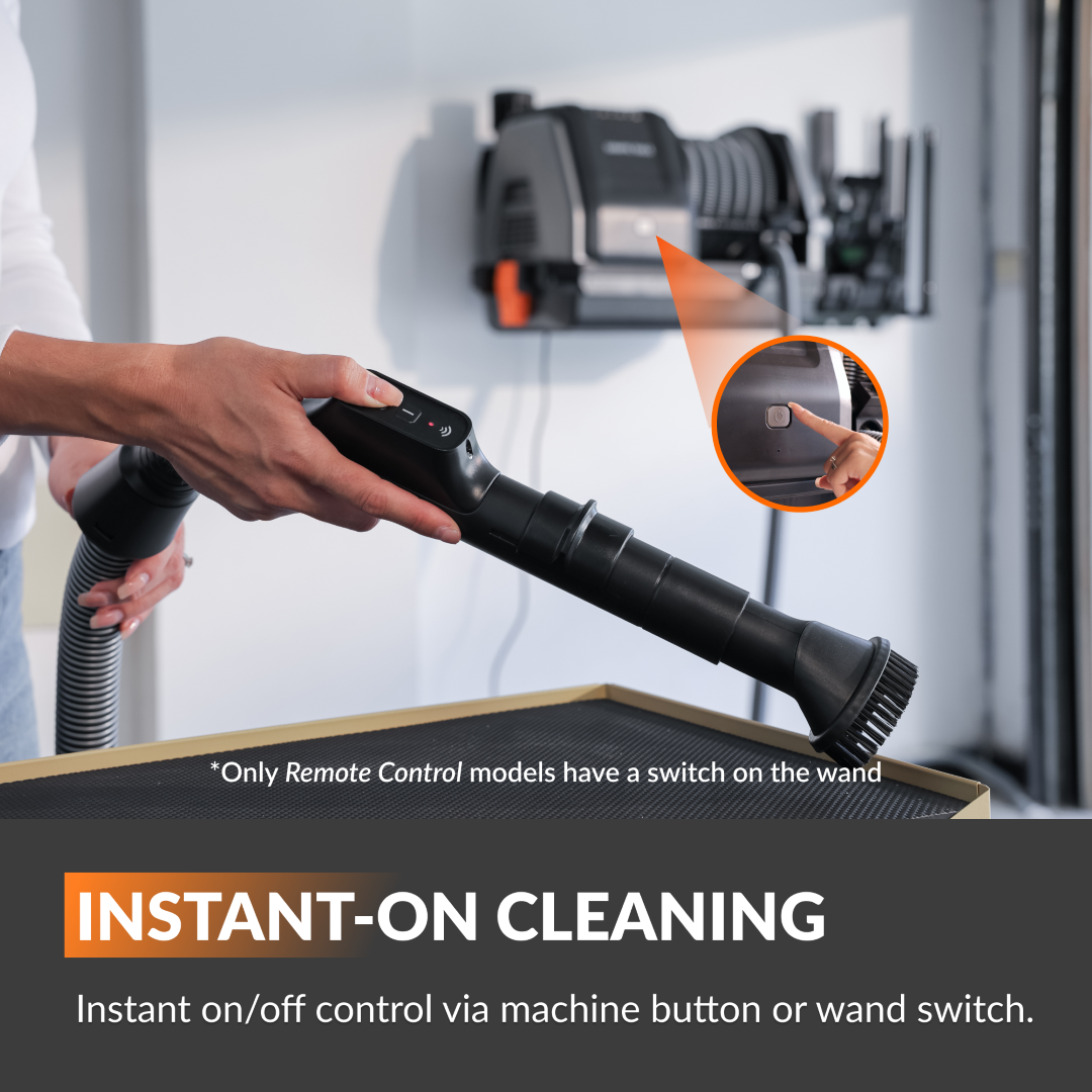 Vacuum wand being held for instant on/off control during cleaning