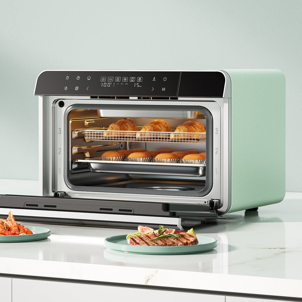 Mint-green ROBAM combi steam oven with open door and food trays in the chamber