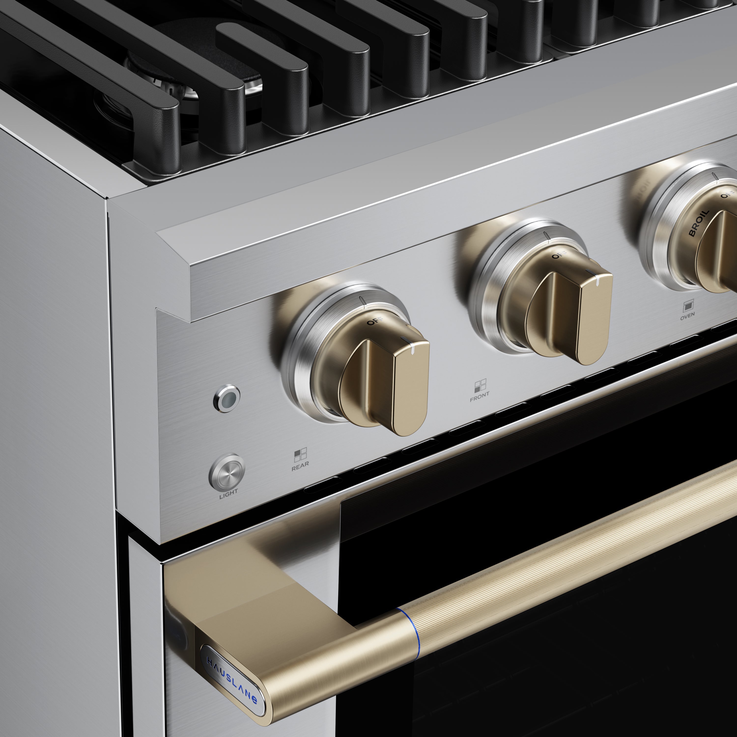 Stainless steel range control panel with burner knobs and brass-finish oven drawer handle.