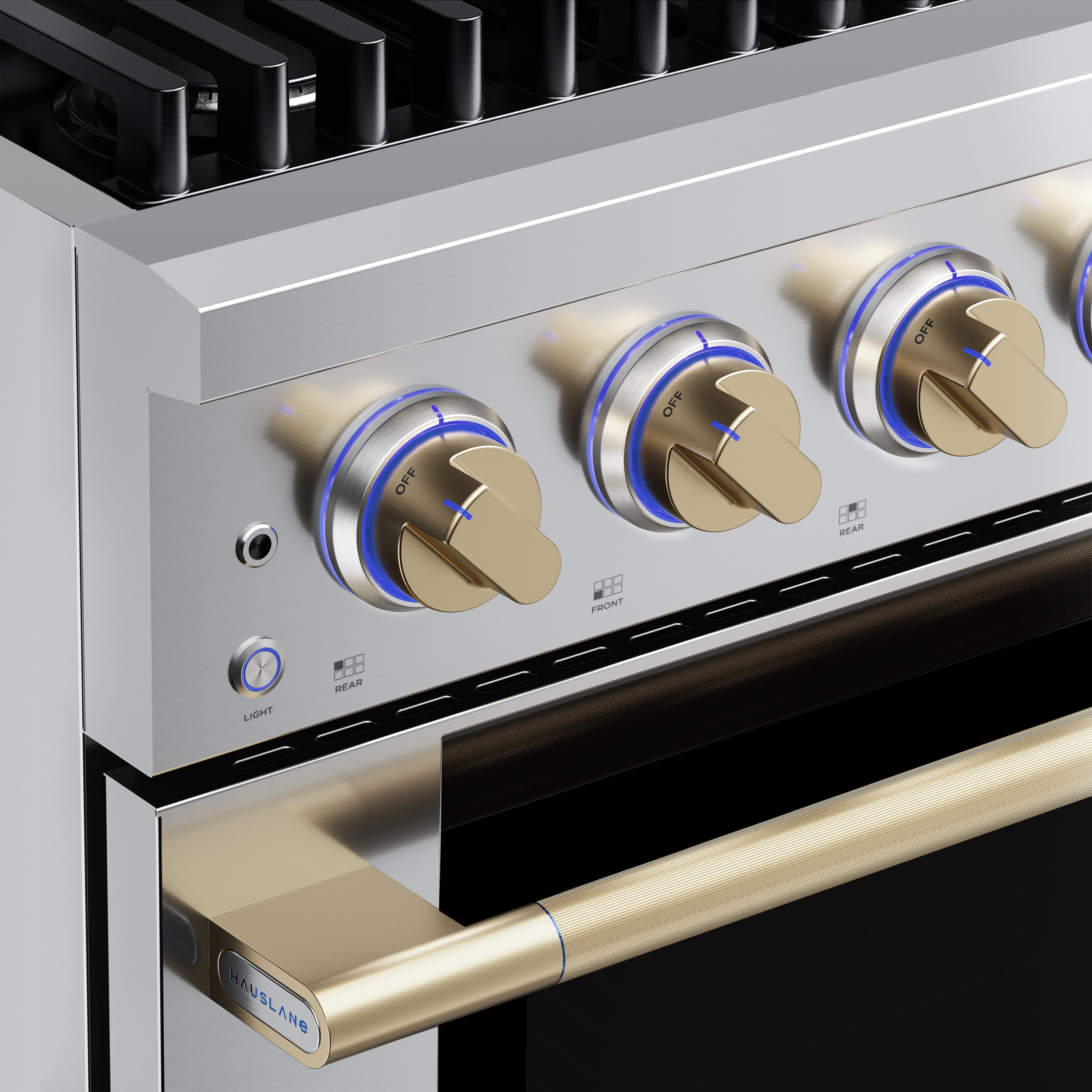 Stainless steel control panel with lit burner knobs and brass-finish oven handle detail