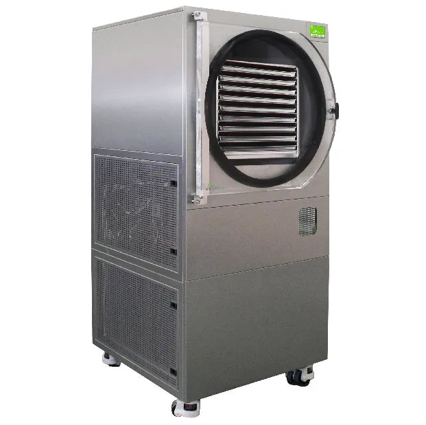 Commercial freeze dryer with round door and ribbed intake panel, front 3/4 view