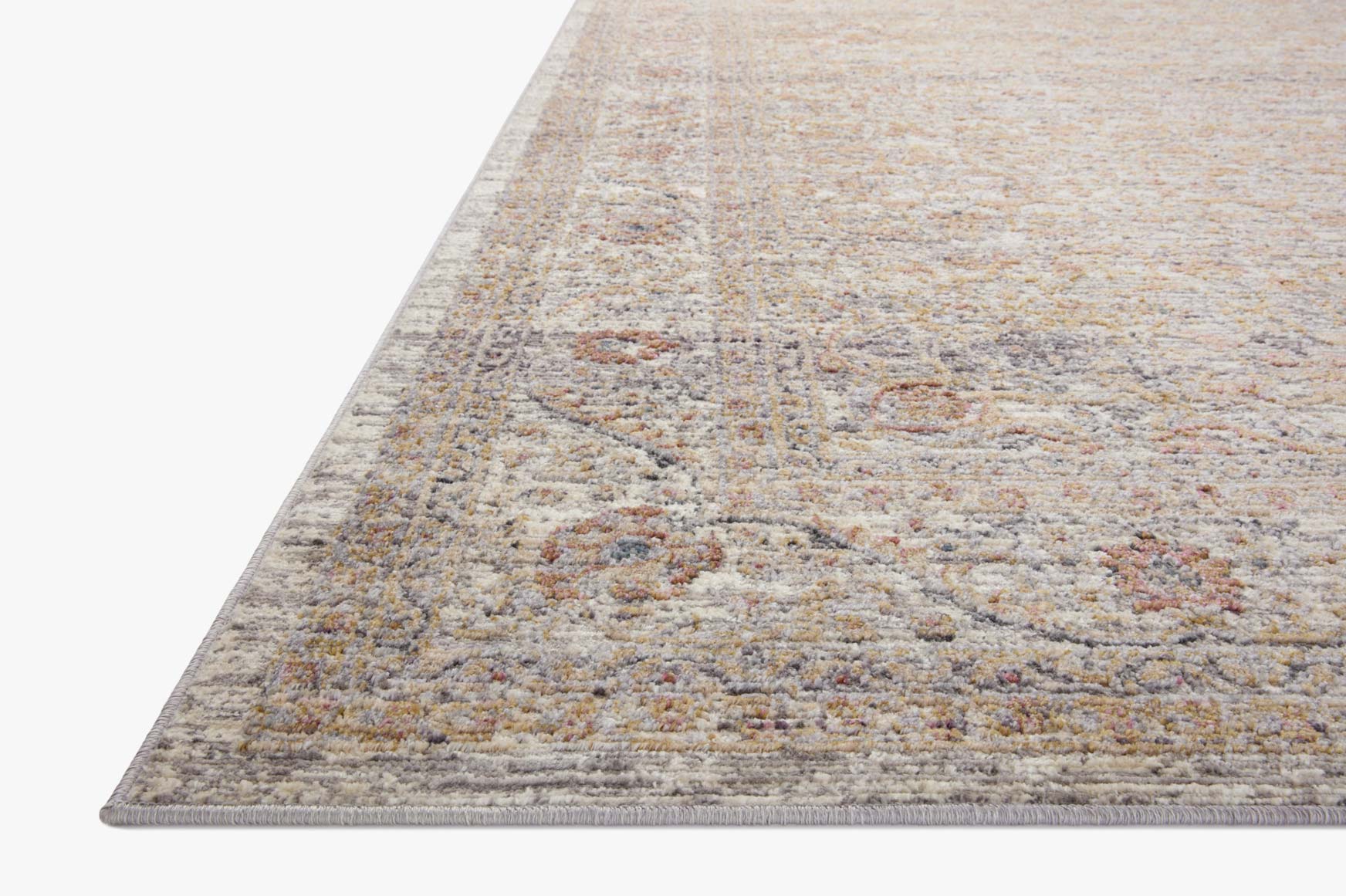 Stone-toned area rug with distressed abstract medallion pattern, fringeless border