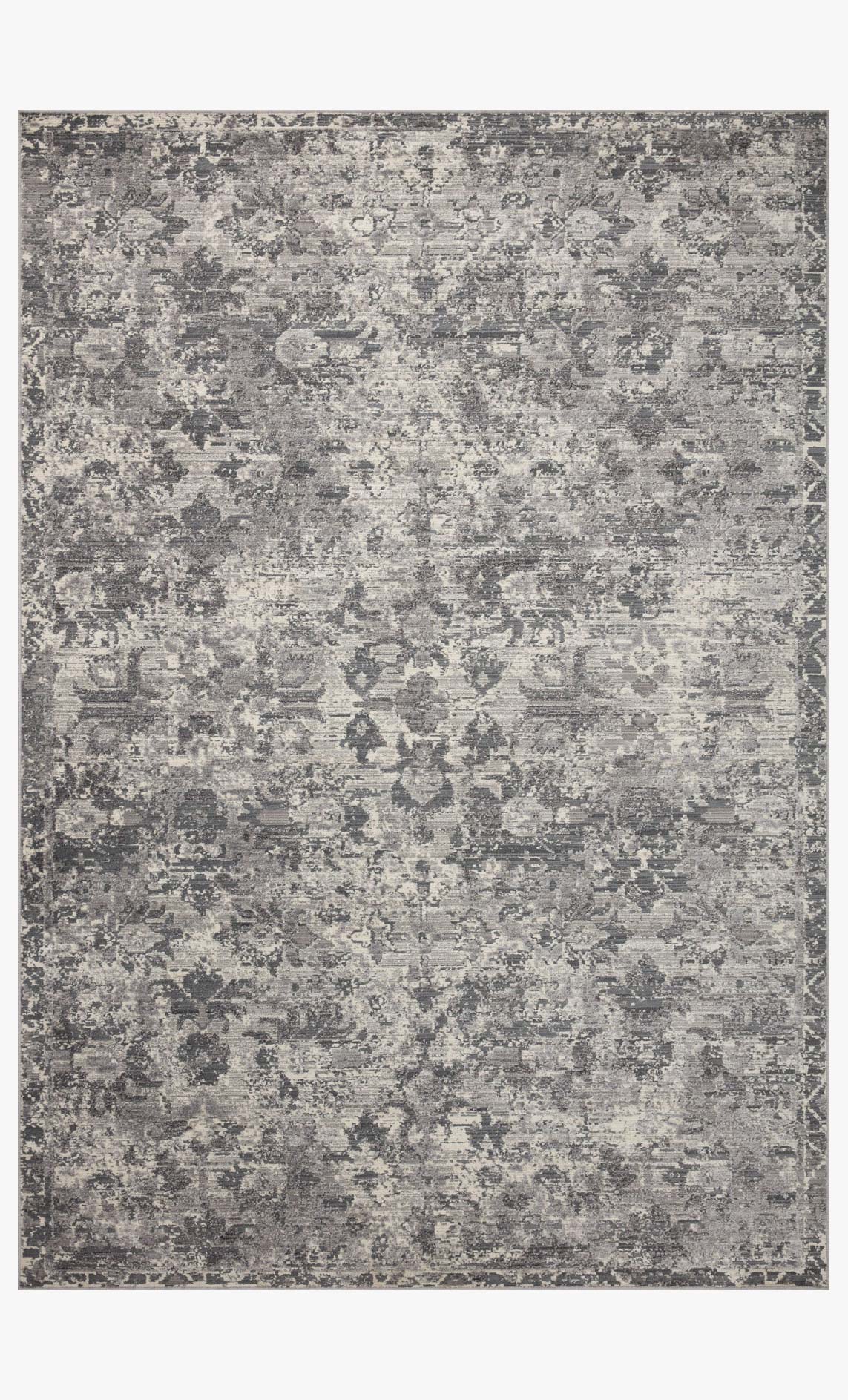 Loloi Indra contemporary area rug in charcoal and silver with dense faded abstract motif