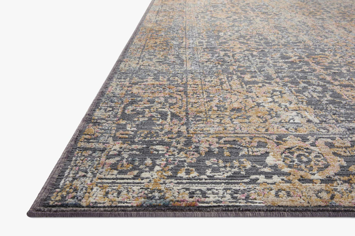 Contemporary area rug with distressed pattern in blue-gray and warm tan accents