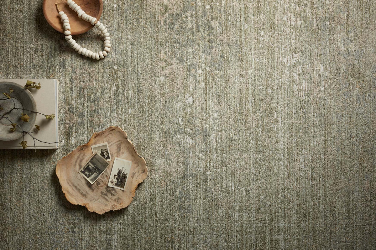 Sage and natural textured runner rug close-up with woven pattern and speckled finish