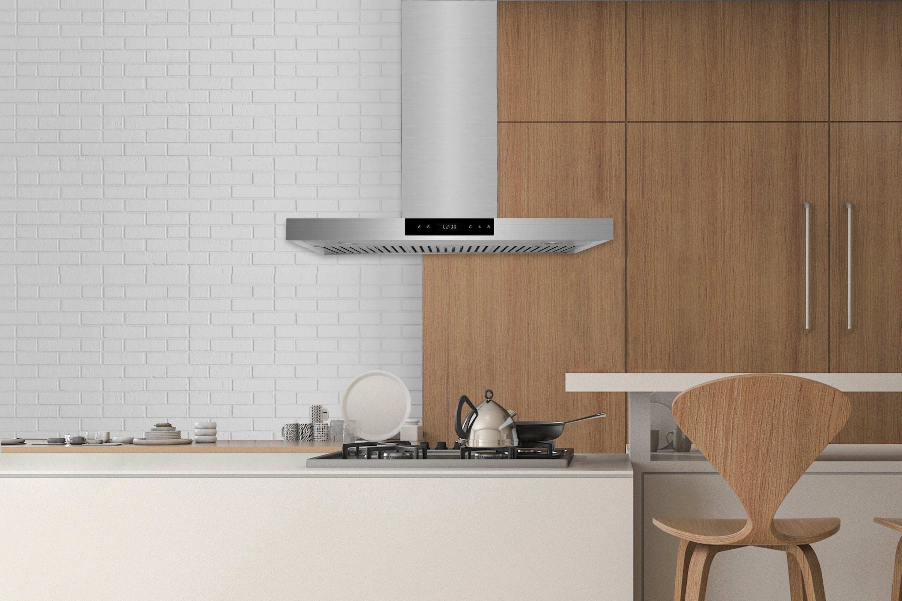Stainless steel island range hood above a cooktop in a kitchen
