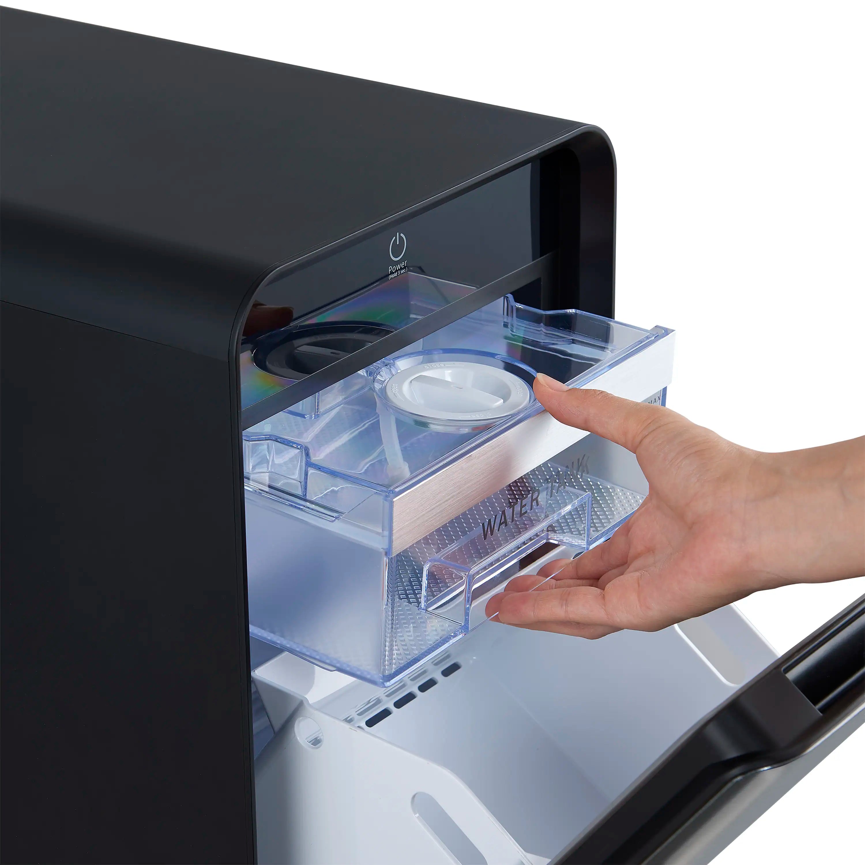 Black 11-inch countertop ice maker with water tank compartment and hand opening
