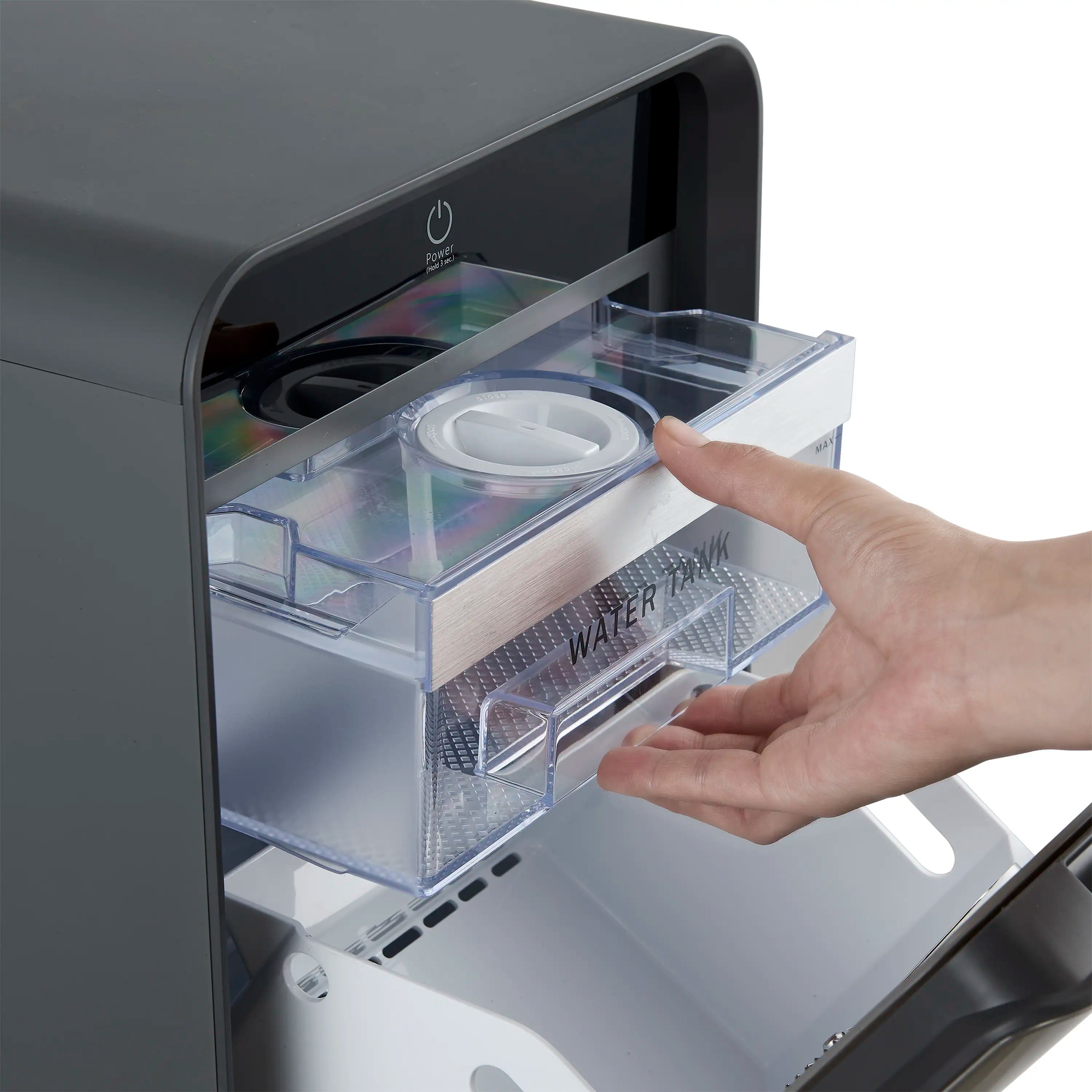 Ice maker with front open and removable water tank pulled out