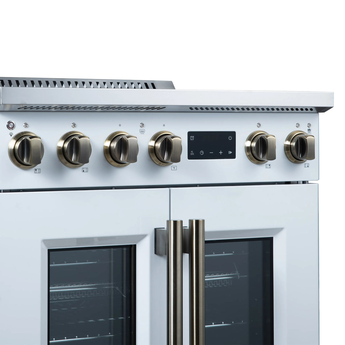 White induction range control panel with brass-colored knobs and digital display