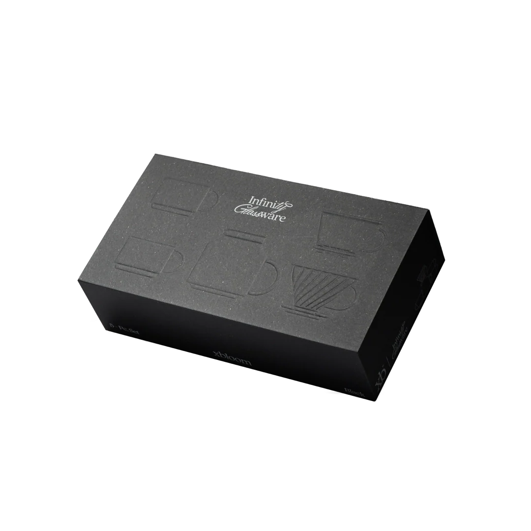 Black presentation case for coffee brewing set with embossed design on lid