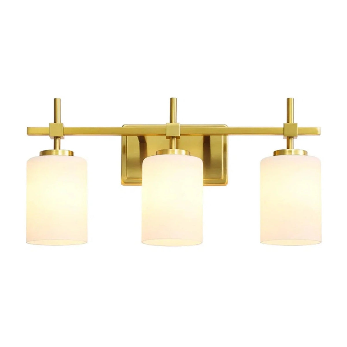 Golden 3-light bathroom vanity light with frosted glass shades on a bar mount