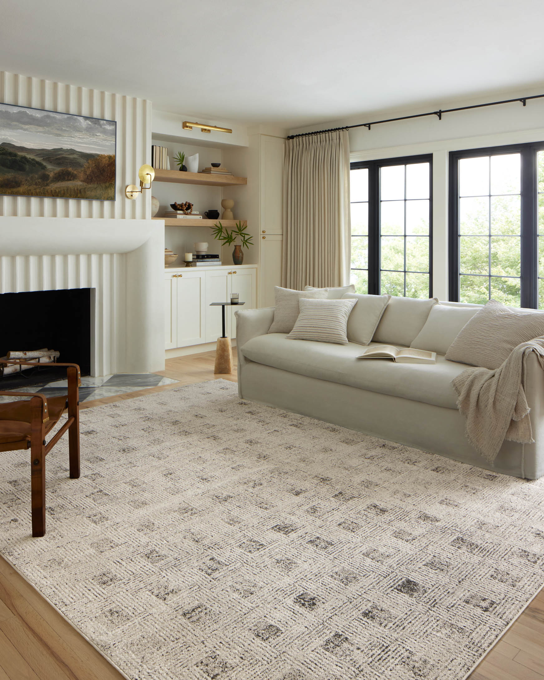 Transitional area rug with light ivory base and distressed grey geometric pattern