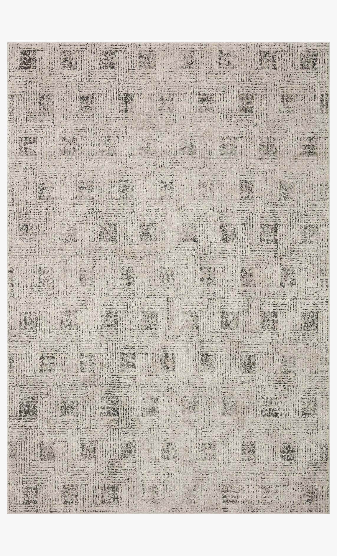 Area rug with light grey field and dark distressed grid-and-block design
