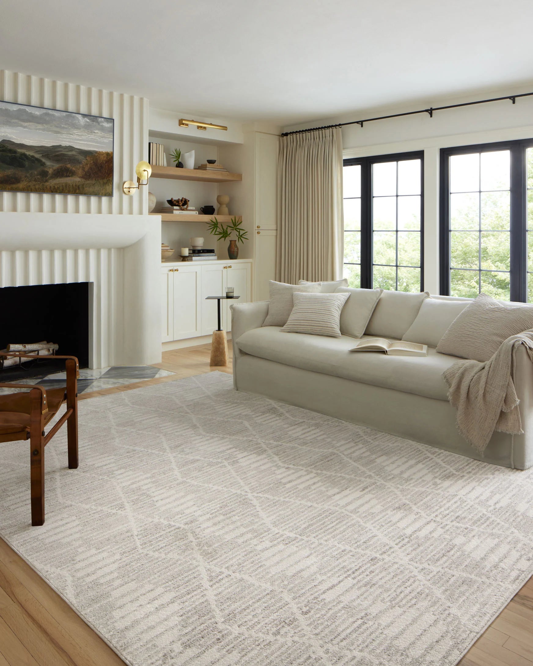 Ivory and silver area rug with low-pile textured geometric design