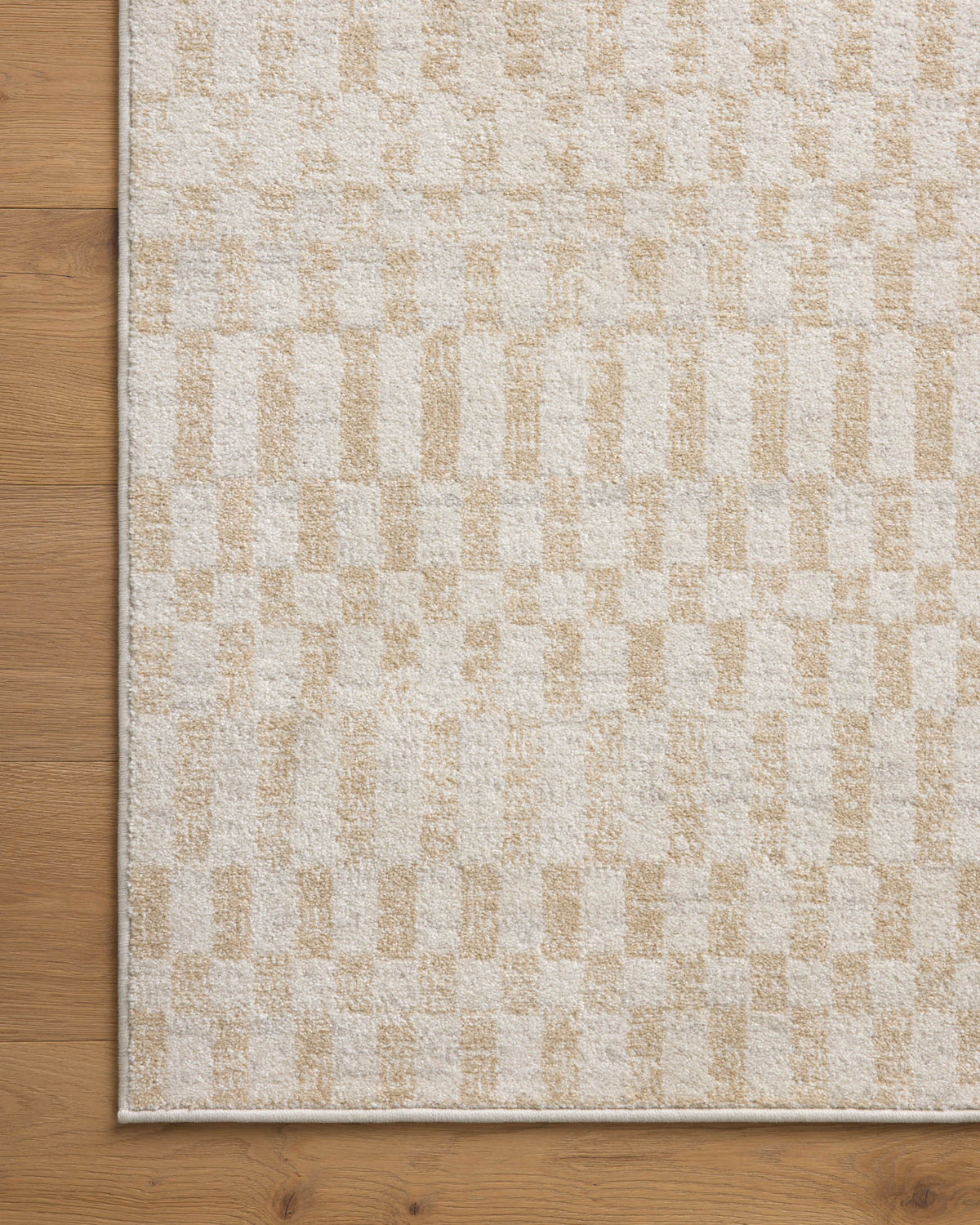 Ivory runner rug with small checker pattern and clean bound edge