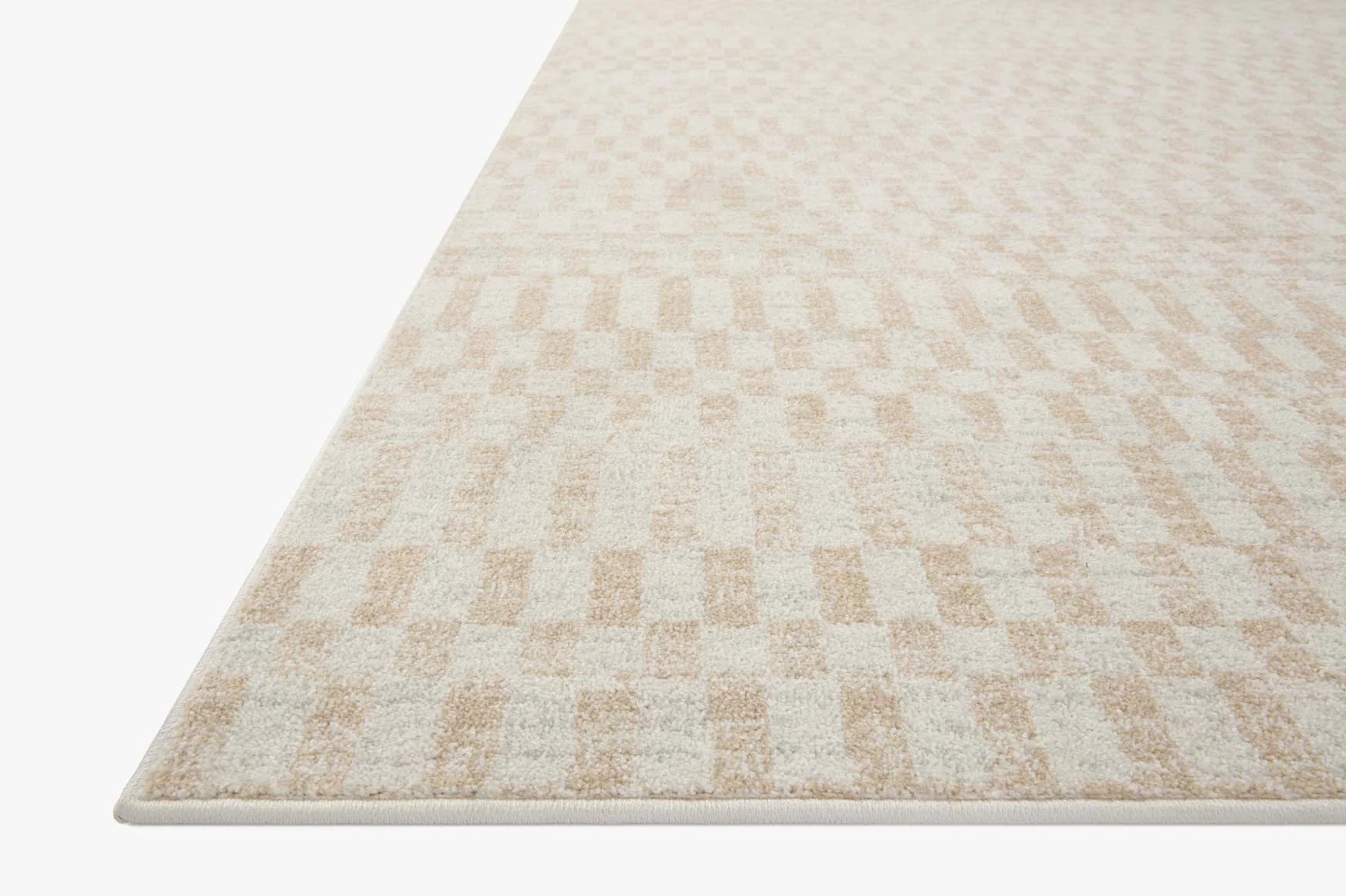Ivory and natural geometric checkered area rug, low pile, textured border edge