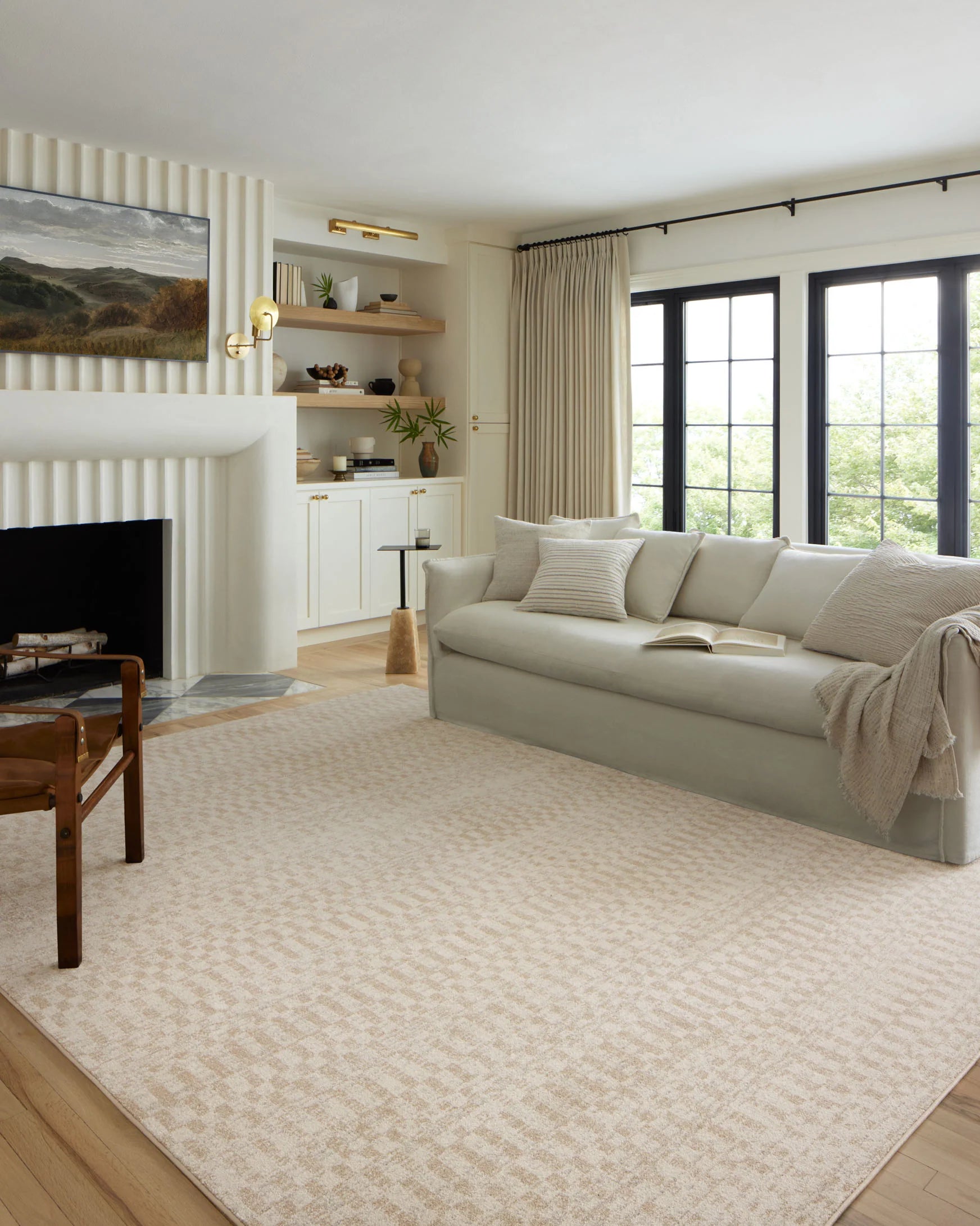 Ivory checker-pattern area rug with low pile laid in a living room