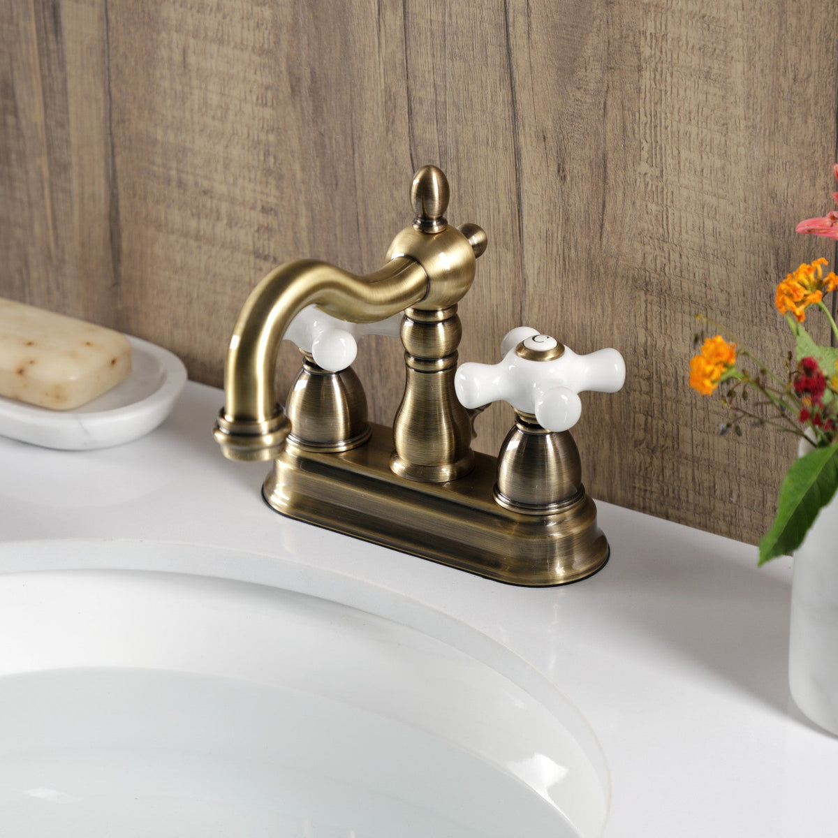 Heritage Double-Handle 4" Centerset Bathroom Faucet with Pop-Up Drain in Antique Brass