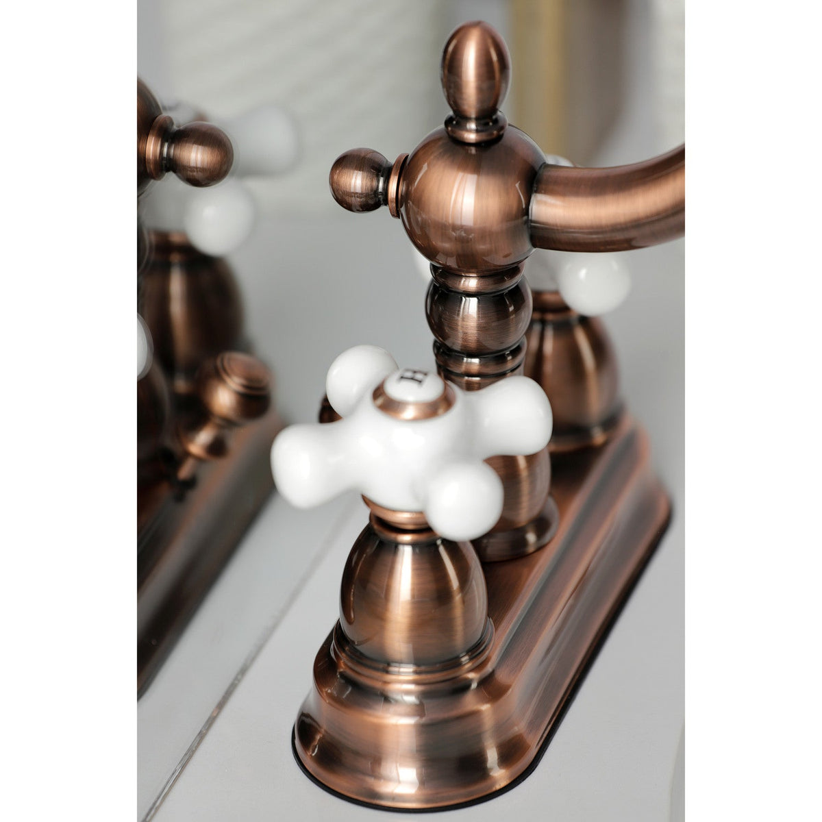 Heritage Double-Handle 4" Centerset Bathroom Faucet with Pop-Up Drain in Antique Copper