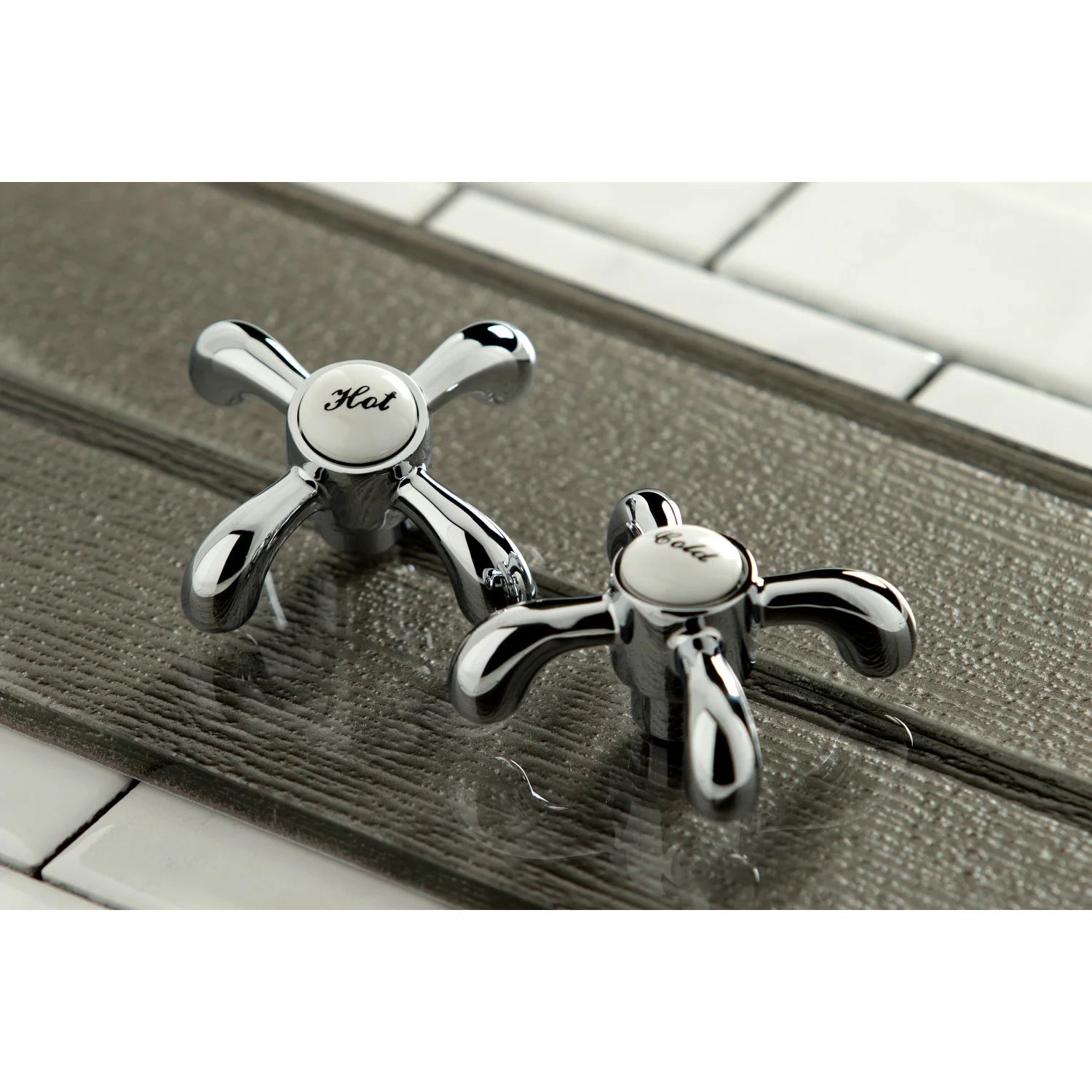 Polished chrome hot and cold cross handles on widespread kitchen faucet
