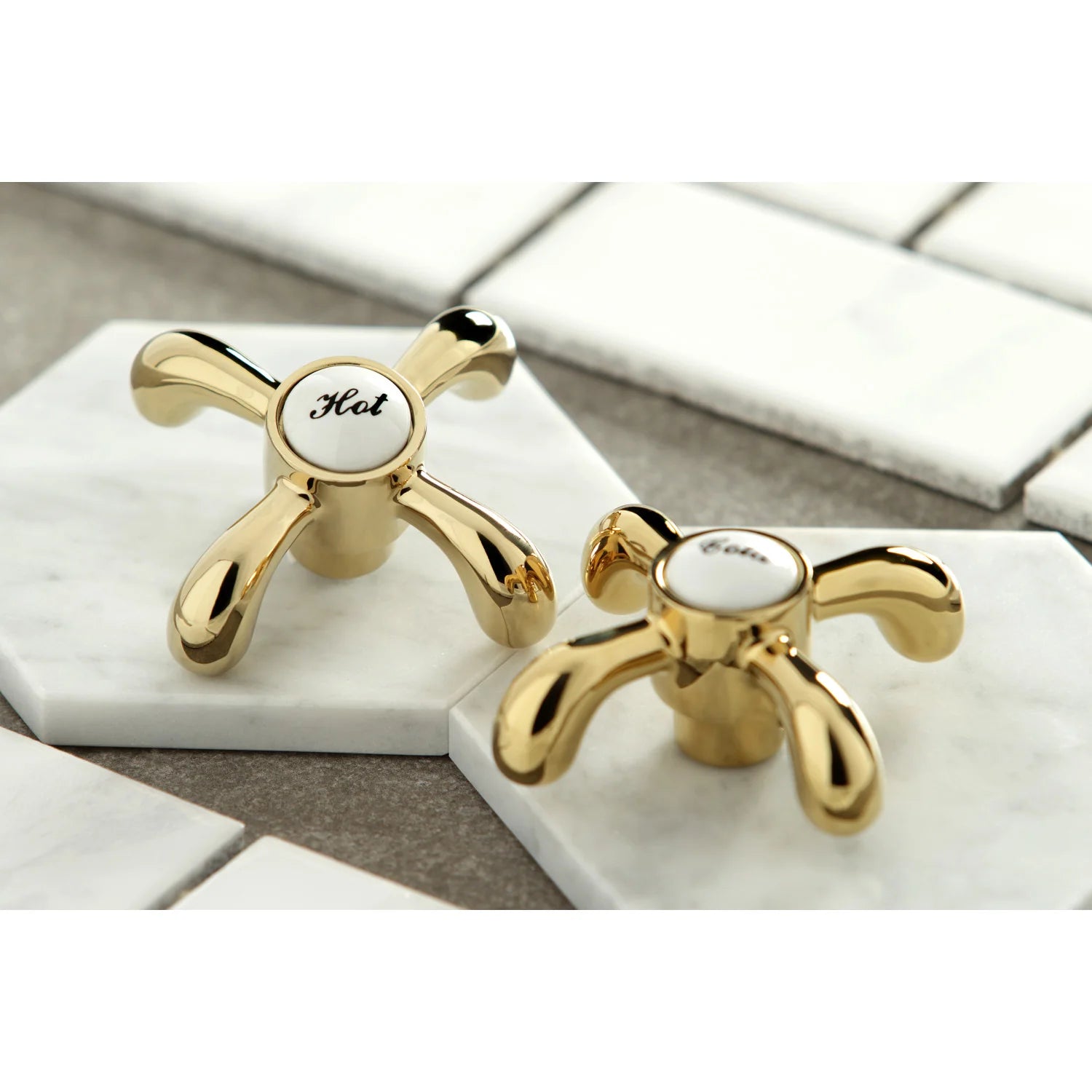 Polished brass faucet with hot/cold cross handles and arched spout