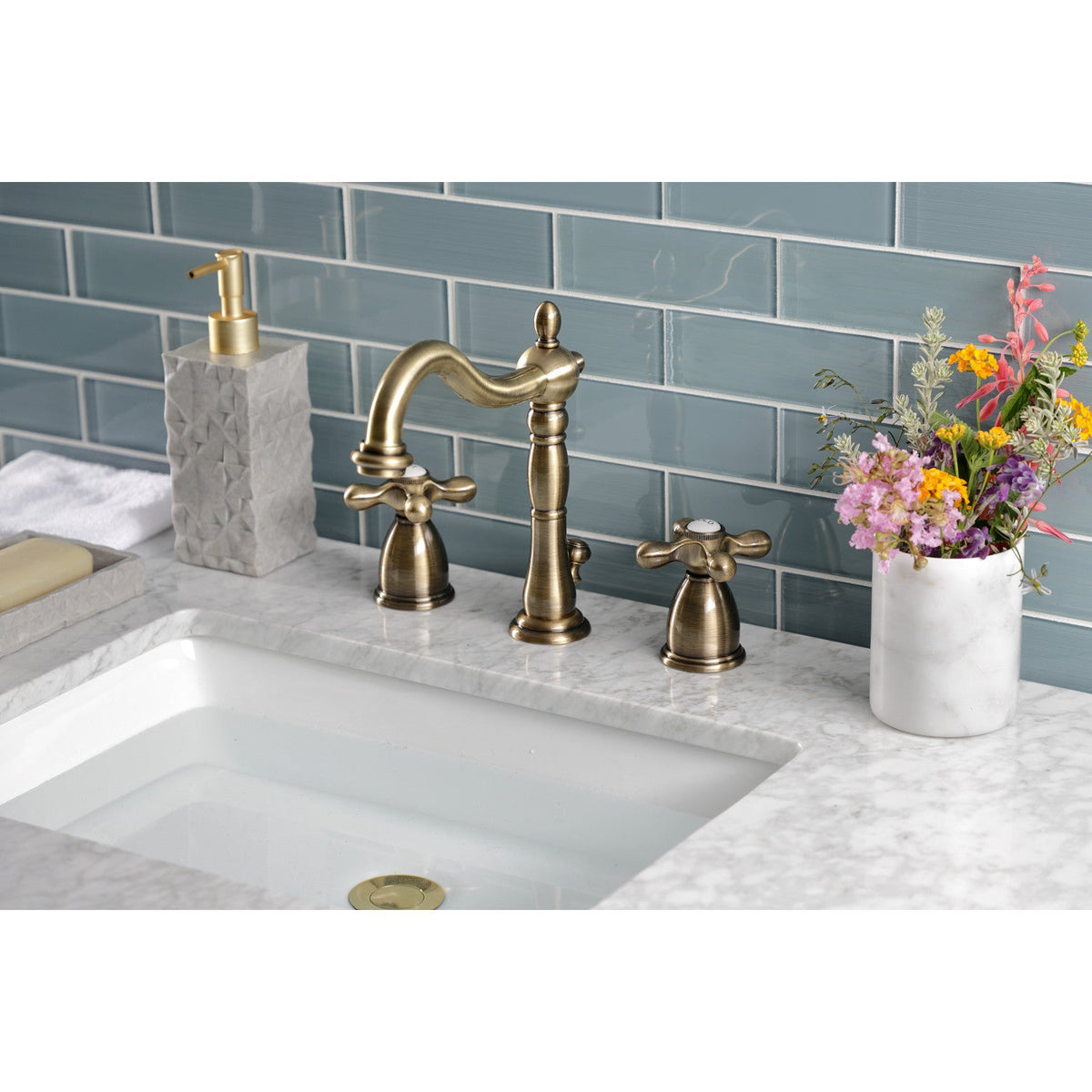 Heritage Widespread Bathroom Faucet with Brass Pop-Up in Antique Brass