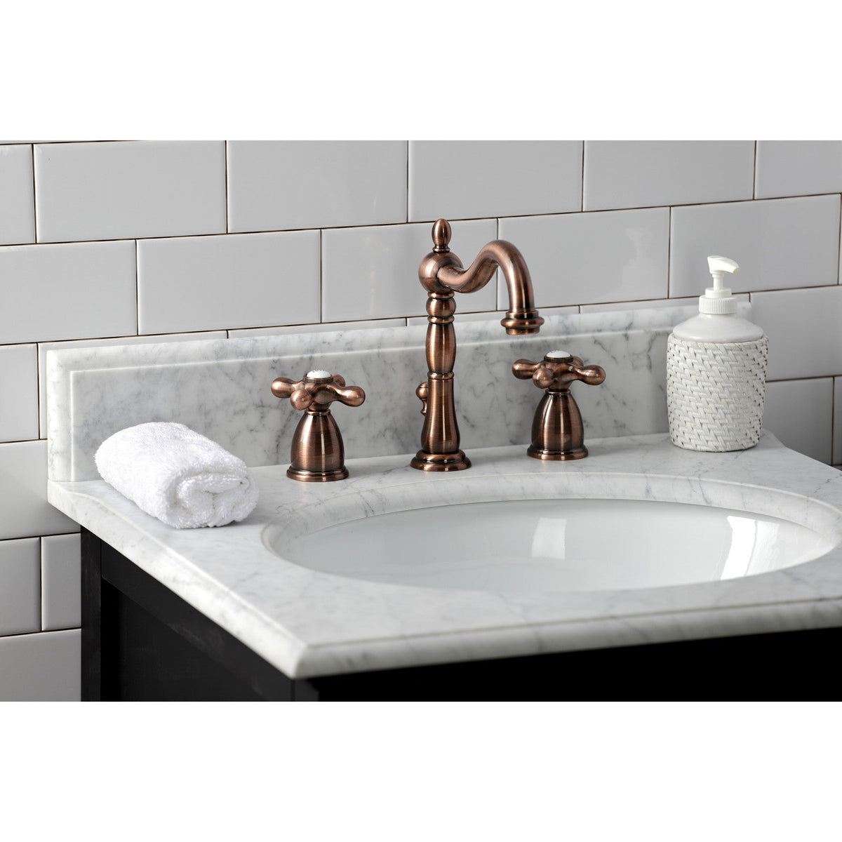 Heritage Widespread Bathroom Faucet with Brass Pop-Up in Antique Copper