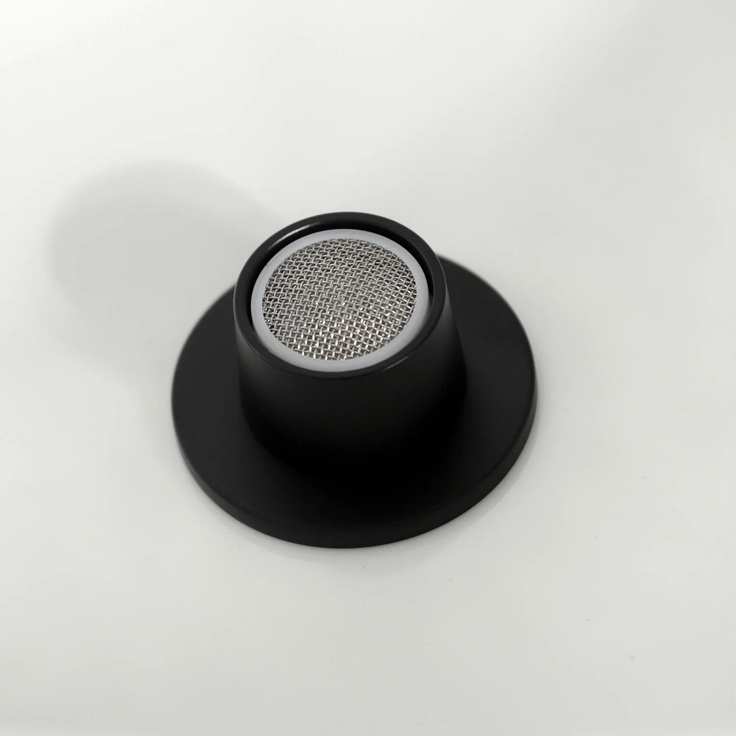 Matte black pop-up drain cap with mesh screen